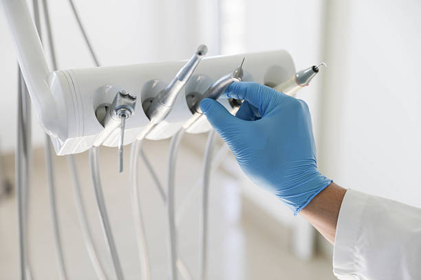 Professional Tooth Extraction technician working in Iberville Parish County, LA